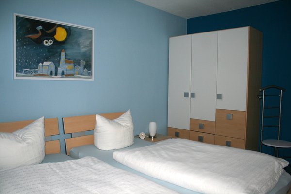 Bedroom with freshly made double bed
